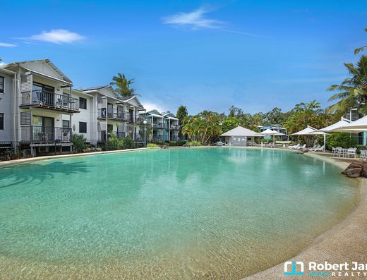 Poolside Dual-Key Opportunity with Renovation Potential image 16