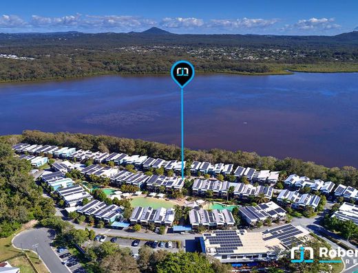 Poolside Dual-Key Opportunity with Renovation Potential image 1