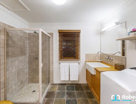 Iconic Garth Chapman Queenslander in a Peaceful Lakeside Setting image 16