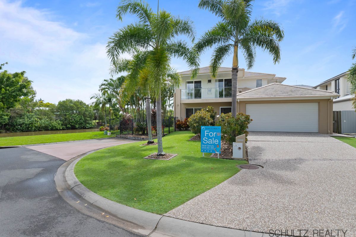 Lake views from this beautiful 4 bedroom, 2 bathroom home with media room in the sought after Augusta Green estate