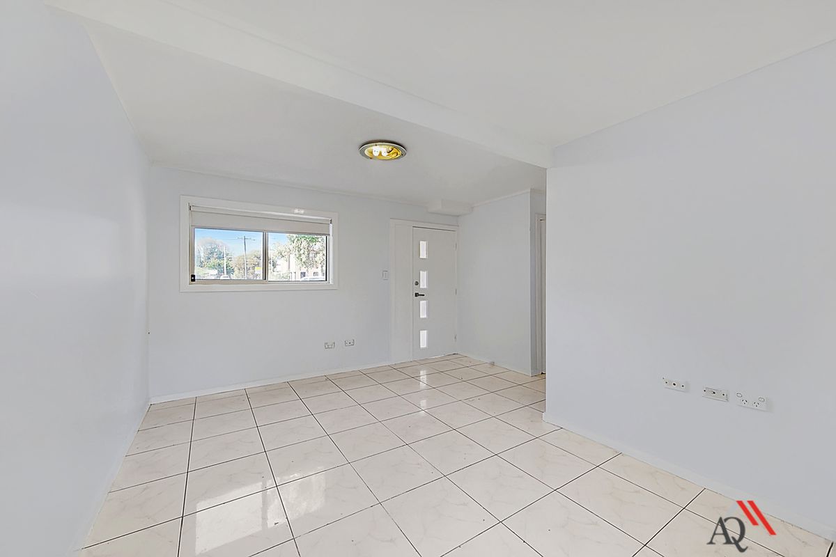 THREE BEDROOM HOUSE WITH SPACIOUS BACKYARD
