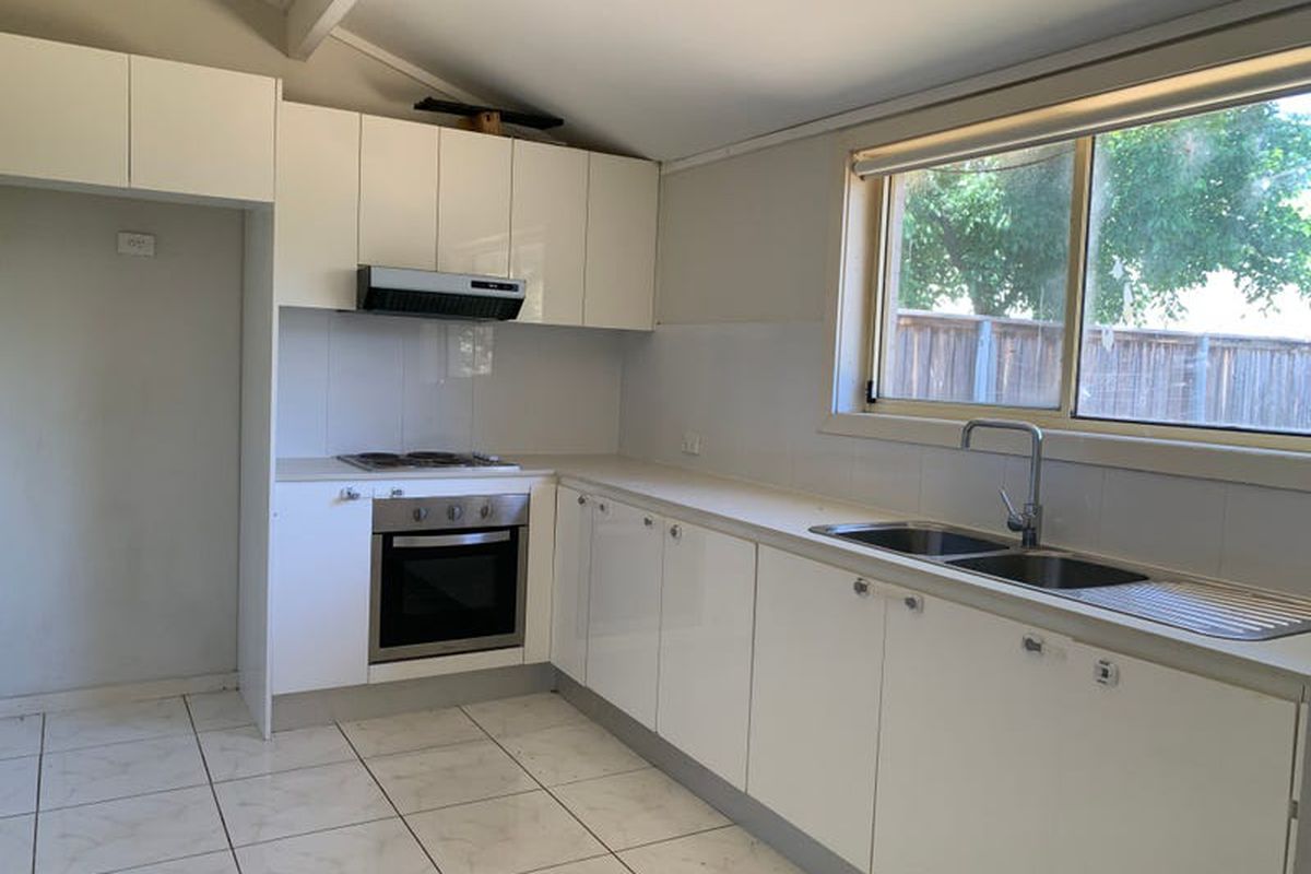 THREE BEDROOM HOUSE WITH SPACIOUS BACKYARD