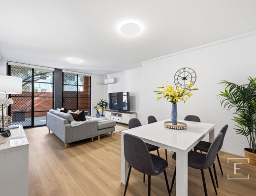 GARDEN OASIS FEATURING DUAL OUTDOOR ENTERTAINMENT SPACES