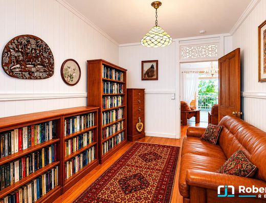 Iconic Garth Chapman Queenslander in a Peaceful Lakeside Setting image 9