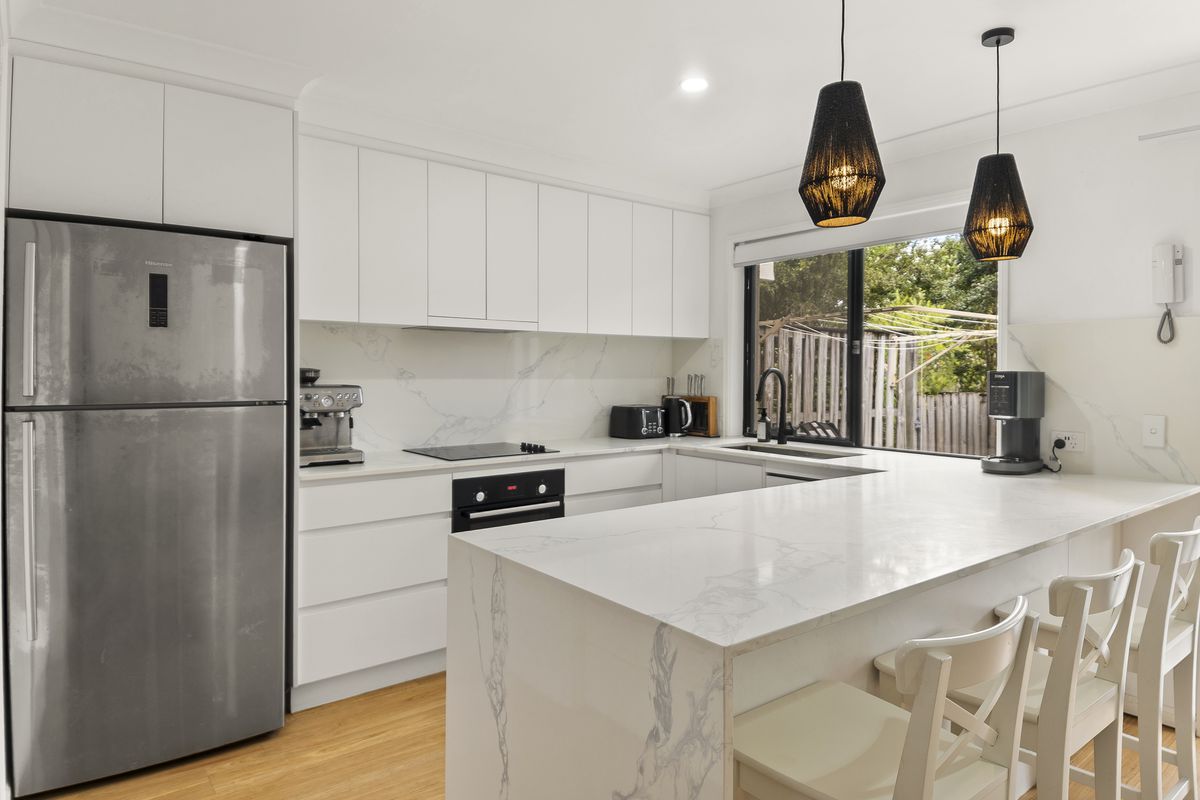 Designer Renovation. Effortless Living. Exceptional Location.