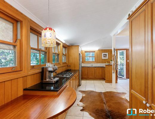 Iconic Garth Chapman Queenslander in a Peaceful Lakeside Setting image 3