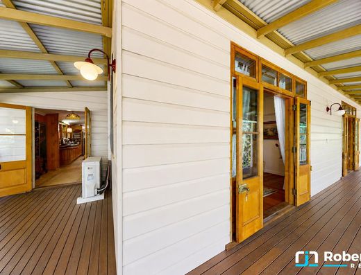 Iconic Garth Chapman Queenslander in a Peaceful Lakeside Setting image 12