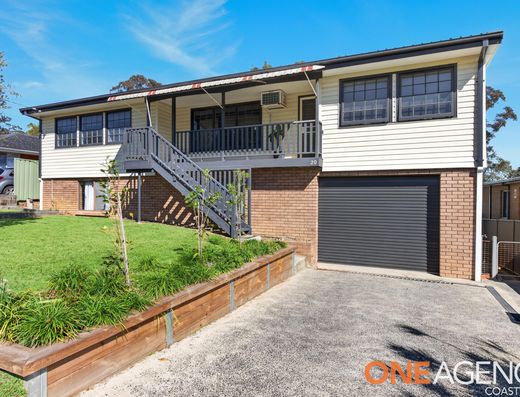 Immaculate Four-Bedroom Home with Huge Garage & Workshop Space