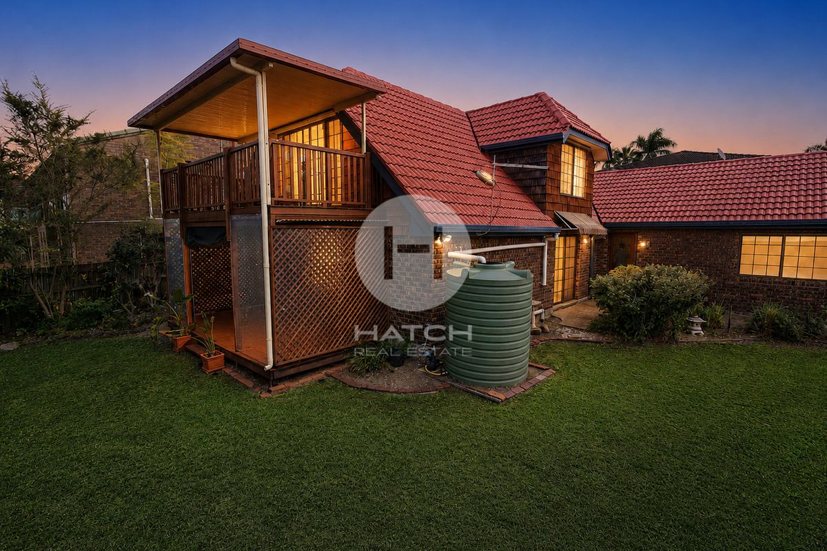 Spacious Four-Bedroom Home with Multiple Living Areas and Elevated Views