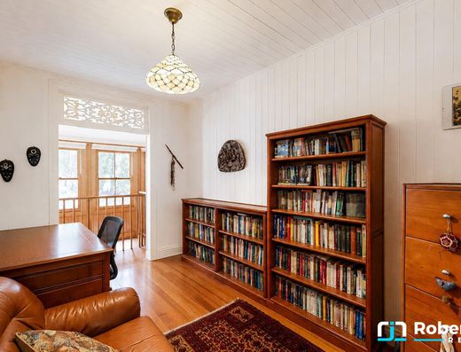 Iconic Garth Chapman Queenslander in a Peaceful Lakeside Setting image 10