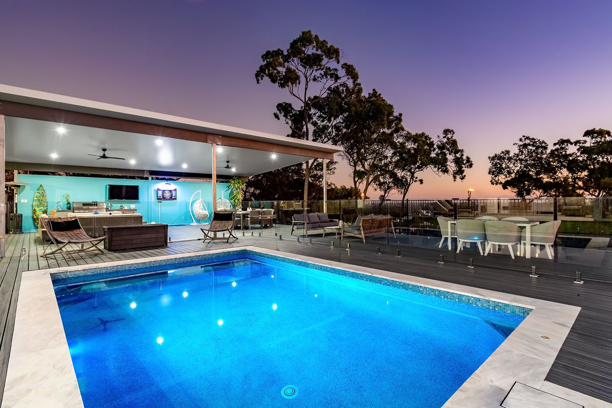 Resort-Style Living with Pool, Spa, Sauna, Shed, Huge Deck & Skyline Views in Coomera Waters Gated Street