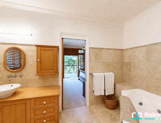 Iconic Garth Chapman Queenslander in a Peaceful Lakeside Setting image 5