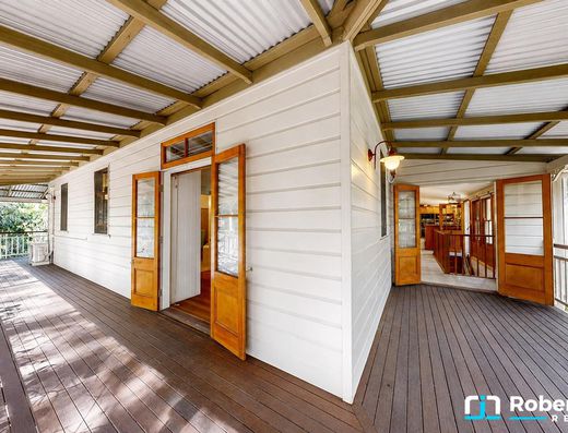 Iconic Garth Chapman Queenslander in a Peaceful Lakeside Setting image 11